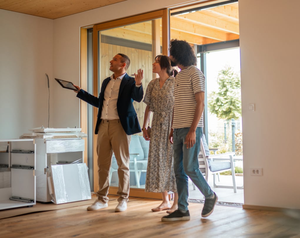 agent showing homebuyers house